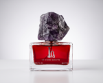 Sweet Addiction Eau de Parfum bottle by Le Vogh with purple gemstone cap